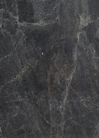 Dark cracked marble texture close-up