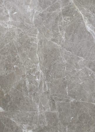 Grey marble texture with white veining pattern.