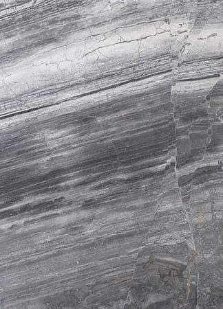 Close-up of striated gray marble texture.