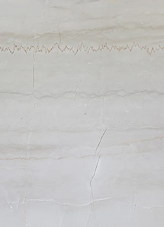 Close-up of light textured marble surface.