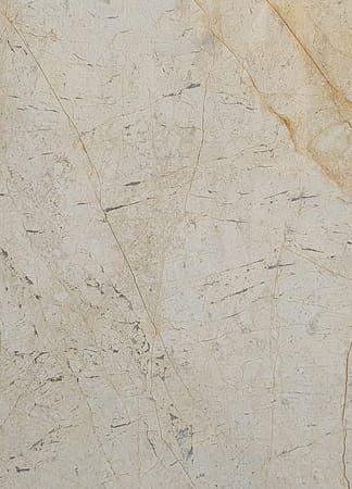 Close-up of textured beige stone surface