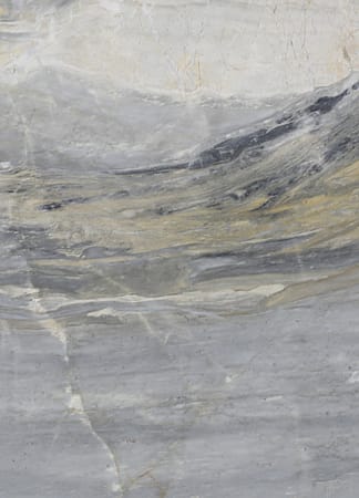 Close-up of textured marble surface with gray tones.