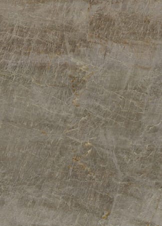 Close-up of textured brown and gray marble surface.