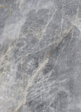 Close-up of gray marble texture with veins
