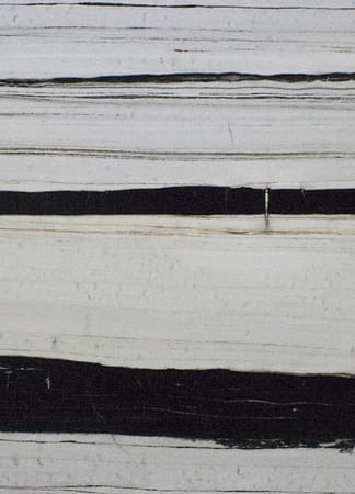 Black and white striped marble texture.