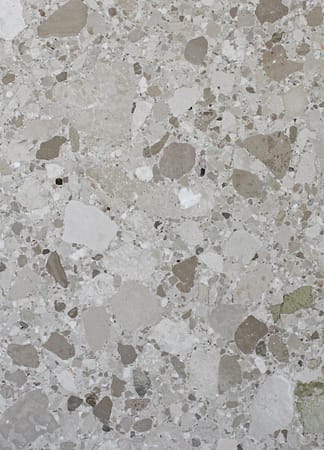 Gray terrazzo tile with mixed stone texture