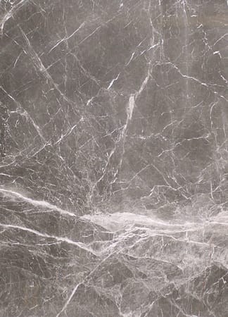 Close-up of gray marble texture with veins.
