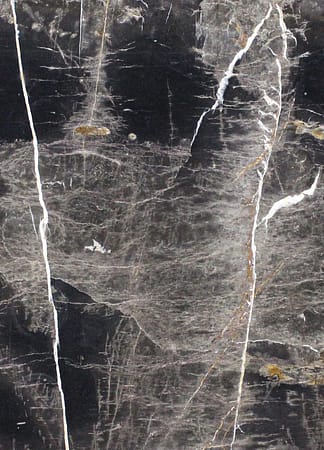 Dark marble surface with white veins
