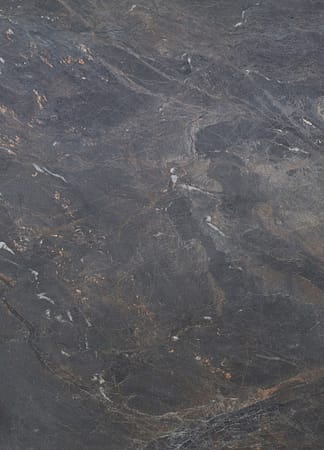 Detailed dark stone or marble texture surface