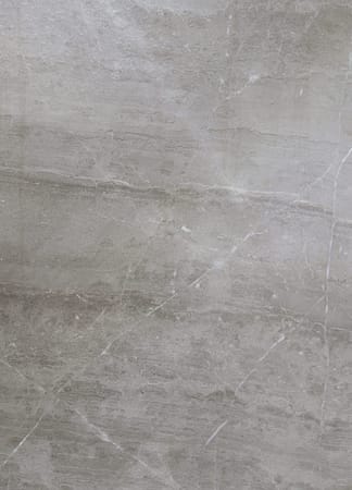 Close-up of gray marble texture with veins.