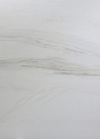 White marble texture with subtle gray veins.