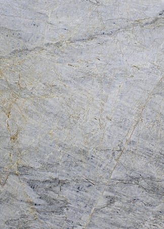 Close-up of gray marble texture with veins.