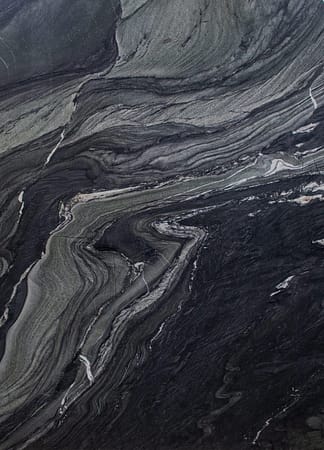 Close-up of dark marble texture with veins