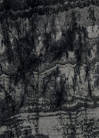 Close-up of dark abstract texture pattern.