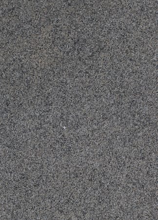 Close-up of rough gray stone texture surface.