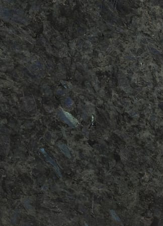 Dark textured stone surface with blue highlights.