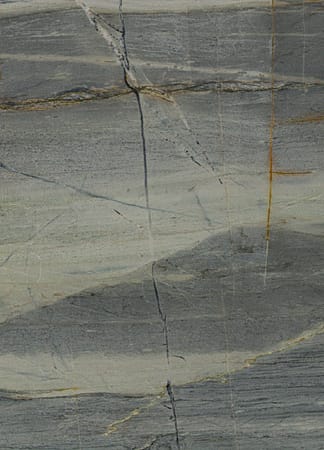 Gray and beige marble texture with natural patterns.