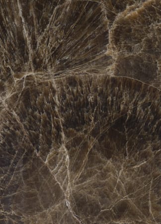 Close-up of textured dark brown marble surface
