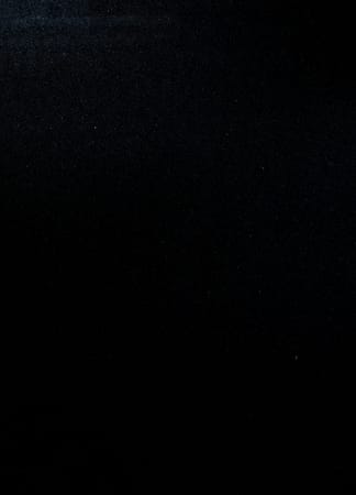 Solid black textured background