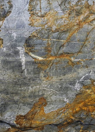 Gray stone texture with orange streaks