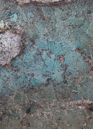 Close-up of textured turquoise rock surface
