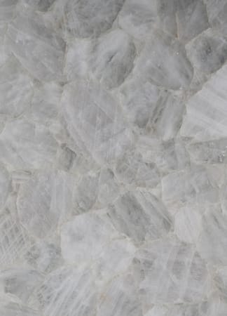 Close-up of white mineral stone texture background.