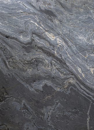 Close-up of dark, textured marble surface