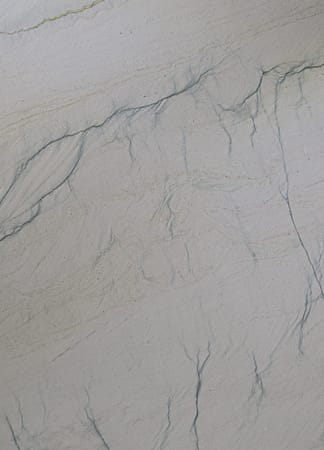Close-up of textured marble surface with veins.