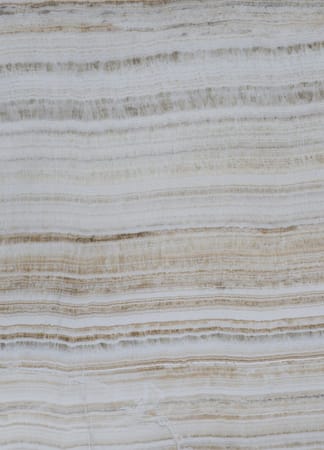 Close-up of beige and white marble texture.