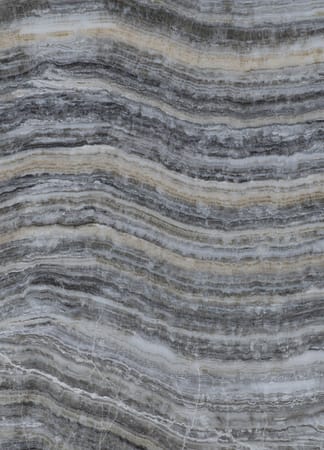 Patterned brown and gray stone surface texture.