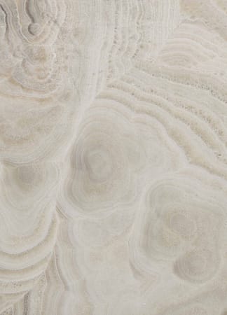 Marble texture with swirling patterns and colors.