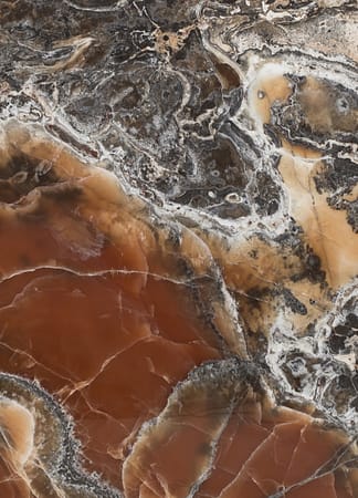Close-up of brown and black marble texture.