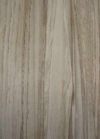 Natural wood grain surface texture close-up.