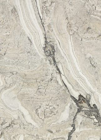 Close-up of textured marble surface with veins