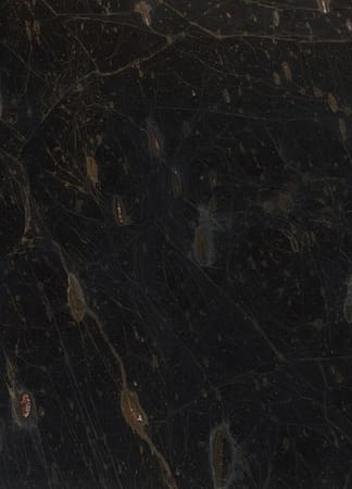 Close-up of dark textured marble surface.