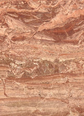 Textured brown marble surface with natural patterns.
