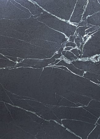 Dark gray marble texture with white veins.