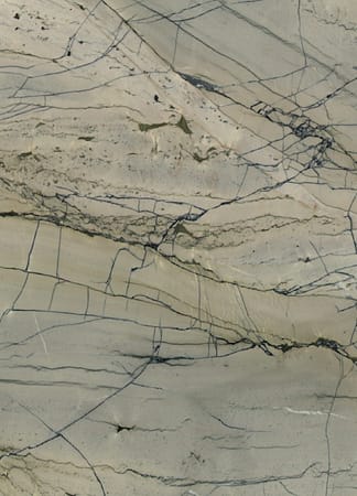 Close-up of cracked beige marble surface