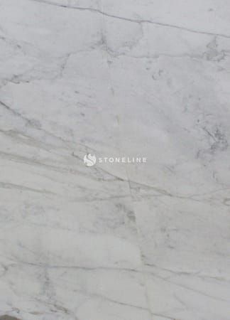 Close-up of white marble surface with veins