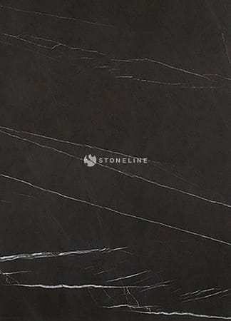 Dark marble surface with fine white veins.