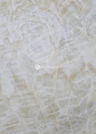 Close-up of textured alabaster stone surface.