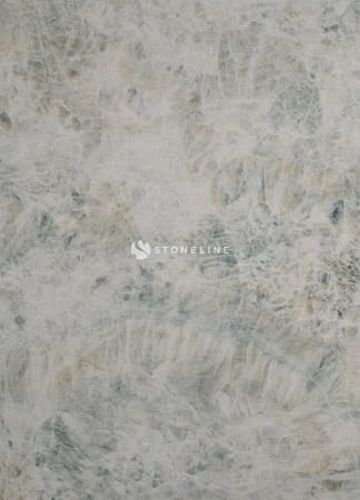Close-up of polished marble texture with natural patterns.