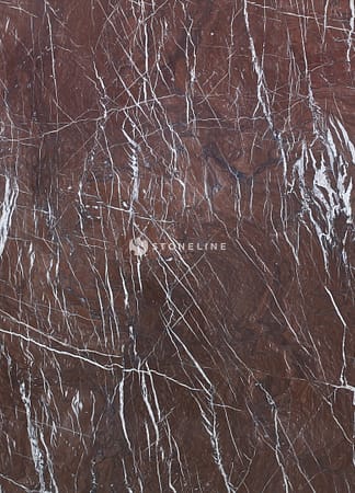 Brown marble slab with white veins texture.