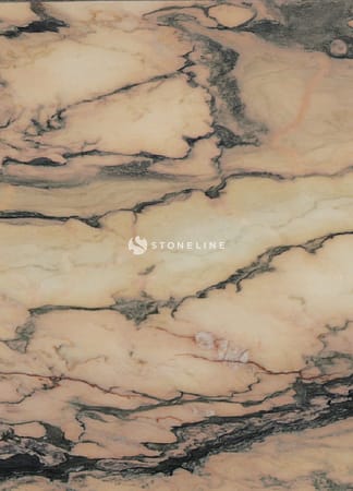 Close-up of marbled stone texture with pink veins.