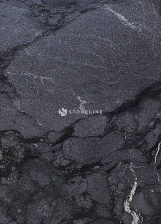 Black marble texture with white veins.