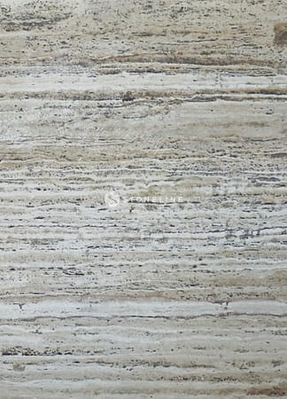 Close-up of beige textured stone surface