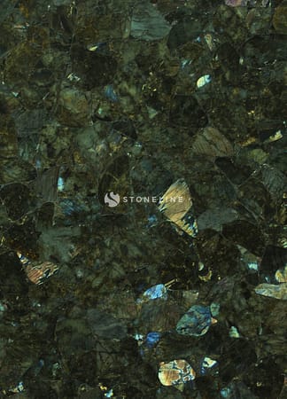 Close-up of dark granite texture with iridescent flecks.
