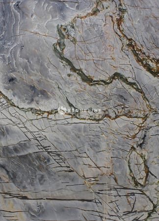 Close-up of textured marble surface with veins.