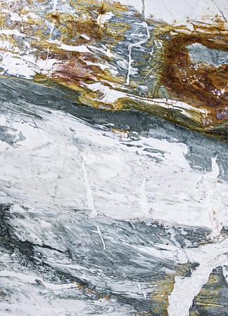 Colorful marble texture with gray and brown patterns.