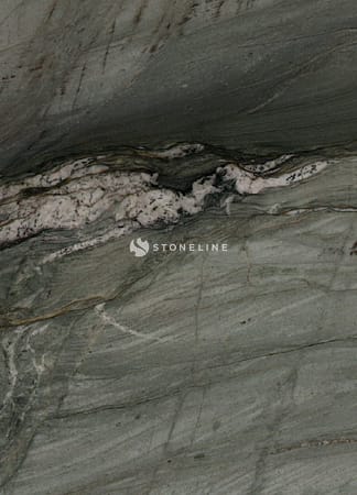 Close-up of green stone texture with veins.